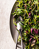 Roasted tender leafy vegetables with garlic