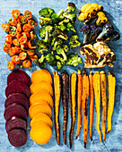 Grilled vegetables - cherry tomatoes, broccoli, cauliflower, beetroot, yellow beetroot and colourful carrots