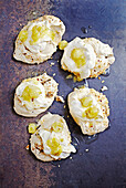 Brown sugar meringue with gooseberry compote and cream