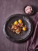 Mini pork roulades with guanciale in wheat beer sauce
