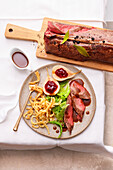 Saddle of venison Baden-Baden with spaetzle and savoy cabbage