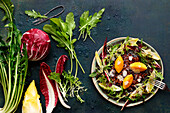 Bitter salads with balsamic port wine lentils and parmesan polenta dumplings