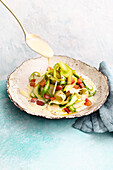 Green asparagus pappardelle à la carbonara with parmesan cream