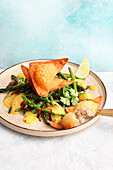 Thai asparagus with curry coconut foam and rice wontons