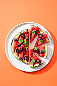 Quick watermelon pizza with berries