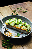 Sourdough bread with paprika hummus and courgette