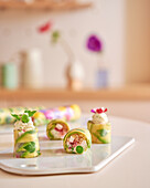 Rice leaf rolls with avocado, feta and quinoa