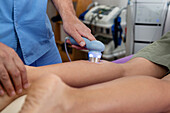 Ultrasound therapy on patients calf
