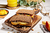 Sweet potato and hummus sandwich with apple and sunflower seeds