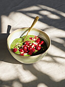 Matcha chia pudding with cherries