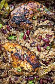 Jerk chicken with rice and peas