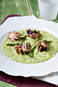 Risotto with green asparagus and baby octopus