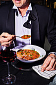 Man eats Zuppa di Verdure