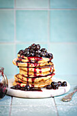 Cream cheese pancakes with blueberry compote