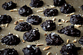 Dark chocolate almond slivers with roasted sesame seeds and sea salt