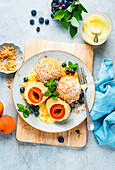 Apricot dumplings with bread crumbs