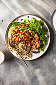 Spiced roasted cauliflower steaks with green salad and quinoa