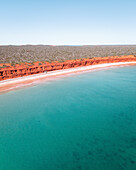 Aerial view of beautiful Bottle Bay with red cliffs and turquoise water, Francois Peron National Park, Australia.