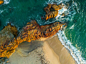 Aerial view of a natural arch along the coast in Jericoacoara, State of Ceara, Brazil.