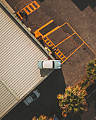 Aerial view of cars above a garage, Albenga, Italy.