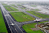 Aerial view of An aerial view runways and aircrafts at the Mumbai's Chhatrapati Shivaji Maharaj International airport at Sahar, Bombay Mumbai, Maharashtra, India