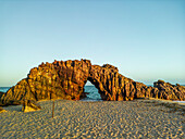 Aerial view of a natural arch along the coast in Jericoacoara, State of Ceara, Brazil.