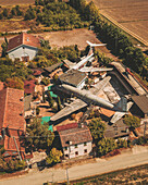 Rovigo, Italy - 26 August 2021: Aerial view of an abandoned night club with Airplanes, Italy.