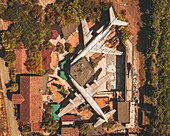 Rovigo, Italy - 26 August 2021: Aerial view of an abandoned night club with Airplanes, Italy.