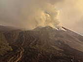 Aerial view of Cumbre Vieja volcano during an eruption with magma and lava in La Palma island, Canary Islands, Spain.