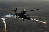 Herat, Afghanistan - 07 June 2014: Aerial view of an A129 'MANGUSTA' helicopter of the Italian Army with anti-tank functions during training in Afghanistan.