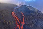 Aerial view of Cumbre Vieja volcano during an eruption with magma and lava in La Palma island, Canary Islands, Spain.