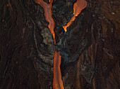 Aerial view of Cumbre Vieja volcano during an eruption with magma and lava in La Palma island, Canary Islands, Spain.