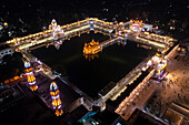 Aerial view of the Sri Harmandir Sahib, a Sikh pilgrimage site in Katra Ahluwalia, Amritsar, Punjab, India.