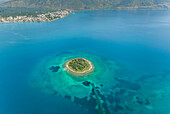 Aerial view of small islet of Itea called Agios Athanasios in Greece