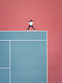 Aerial concept of a person on a tennis court.
