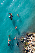 Aerial view of rusty industrial structure in the sea.