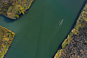 Aerial view of a group of men doing sport in a Kayak in estuary of river Vouga, in Ria de Aveiro, Bioria, Salreu, Estarrega, Aveiro, Portugal