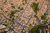 Aerial view of north residential district of Medellin, a dense population favela in town, Antioquia, Colombia.
