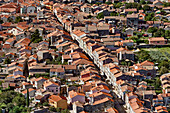 Aerial view of quaint European village with charming red roofs and stone buildings, Main Street, Vodnjan, Croatia.