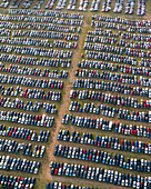 Aerial view of organized rows of cars in a crowded parking lot, Salisbury, England.