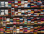 Aerial view of colorful cargo containers and cranes at a bustling shipping port, Corringham, United Kingdom.