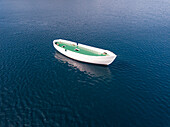 Aerial view of unfinished boat anchored alone at Adriatic sea, Croatia.