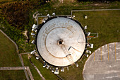 Aerial view of a circular water tower and industrial landscape with modern architecture, Sebastian, United States.