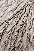 Aerial view of abstract geological formations with wavy lines and textures, Sunshine Mine, Fellsmere, Florida, United States.