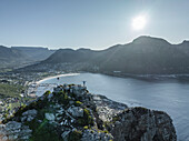 Aerial view of a person on Sentinel Peak along the Hout Bay, Cape Town, Western Cape, South Africa.