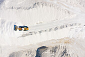 Aerial view of machines working at salt production facility, Australia.