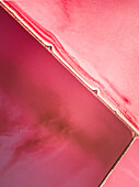 Aerial view of Hutt Lagoon pink salt bed lake in Yallabatharra, Australia.