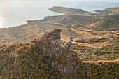 Aerial view of a person on top of Le Chat y La Souris mountain or Mount Villars, in the Bambous Range near Grand Sable, Flacq, Mauritius.