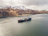 Aerial view of a shipping boat in Unalaska bay, USA