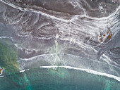 Aerial view of abstract pattern created by a red sand beach, Faroe island.
